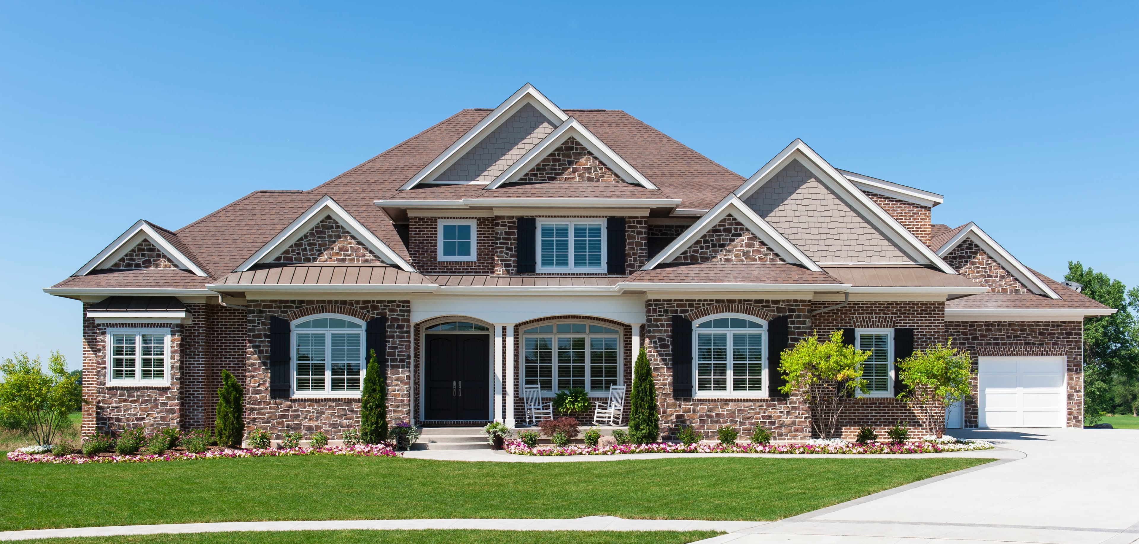 A custom stone-and-brick home built by S.D. Construction